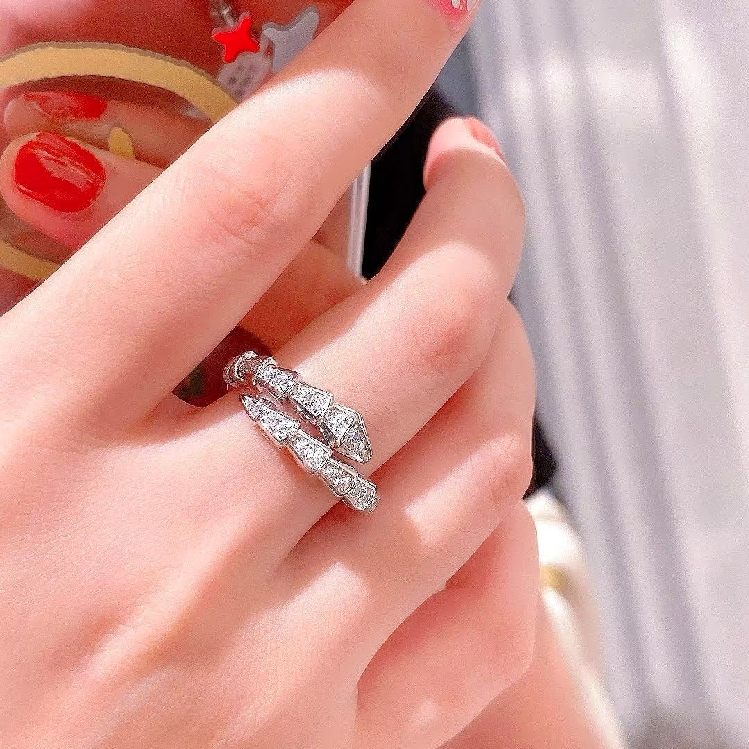Snake bone ring with diamonds