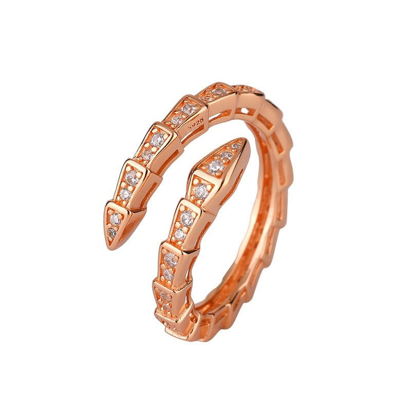 Snake bone ring with diamonds